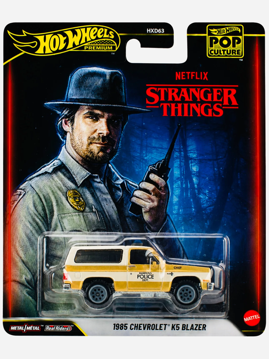 Hot Wheels Premium Stranger Things 1985 Chevrolet K5 Blazer Hawkins Police die-cast in illustrated blister package