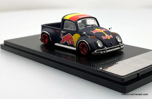Black Volkswagen Beetle pick-up die-cast with Red Bull-themed graphics and red wheels on a display base